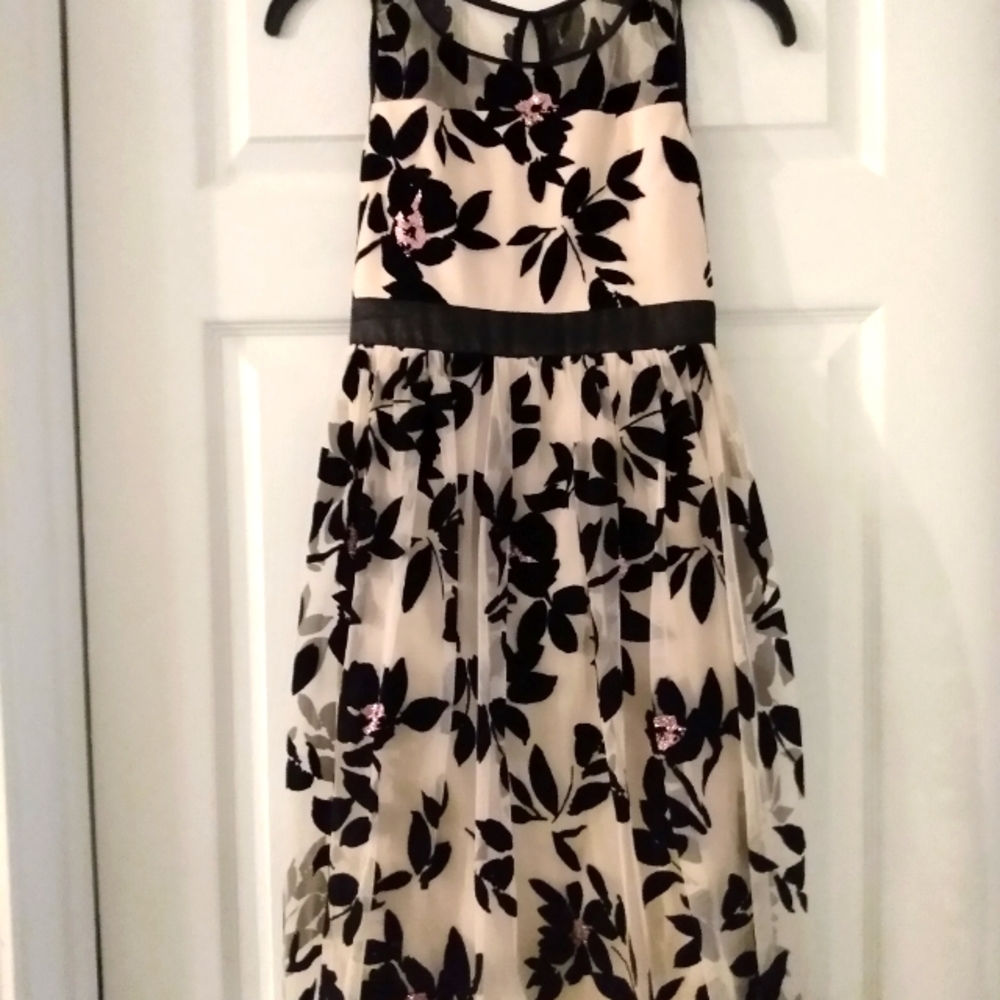 Dress. Pink w/black leaf accent. Pink sequin. Satiny waste band back tie. Zips